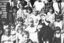 546: Madge Barry's birthday party. (circa 1963) [courtesy of Mary (Barry) Bruce] ** also see 547 **  Top row left-to-right, Ethel Lambe (kerchief), Myra Carroll (glasses), Eileen Ryan (with an  arm around her shoulder), unidentified (owner of arm), Gert Ryan (white dress),  Rose Whelan (plaid dress), unidentified, Marion Counsel (wearing tie); 2nd to top row,  Marilyn Rose (bangs, striped dress), Patricia Ryan (tall), Mercedes Ryan, Anne Marie Ryan  (blonde), ? Ryan, Linda Whelan; 3rd to top row, ? Ryan (with bangs),  ? Ryan (cheeks puffed up), Christina Ryan, Sheila Ennis (blonde), Madge Barry (white bonnet  and black dress), unidentified (boy's face), Anita Counsel (bib front); bottom row,  Ursula Ryan, Margie Ryan, Anthony Ryan (front), Joanie Ryan (with suspenders).  - Madge Barry (of Denis Patrick Barry &amp;amp; Kathleen Hayes)  - Myra Carroll (of Michael Carroll &amp;amp; Josephine Barry)  - Anita Counsel (of Michael Counsel &amp;amp; Mary Anne Barry)  - Marion Counsel (of Michael Counsel &amp;amp; Mary Anne Barry)  - Sheila Ennis (of Vince Ennis &amp;amp; Mary Carroll)  - Ethel Lambe (of James Lambe &amp;amp; Catherine Rodgers)  - Marilyn Rose (of Raymond J Rose &amp;amp; Norah Mullins)  - Anne Marie Ryan (of Maurice Ryan &amp;amp; Norah McCarthy)  - Anthony Ryan (of John Ryan &amp;amp; Joan Barry)  - Christina Ryan (of John Ryan &amp;amp; Joan Barry)  - Eileen Ryan (of Albert Ryan &amp;amp; Catherine Nolan)  - Gert Ryan (of John Ryan &amp;amp; Joan Barry)  - Joanie Ryan (of John Ryan &amp;amp; Joan Barry)  - Margie Ryan (of Maurice Ryan &amp;amp; Norah McCarthy)  - Mercedes Ryan (of John Ryan &amp;amp; Joan Barry)  - Patricia Ryan (of Maurice Ryan &amp;amp; Norah McCarthy)  - Ursula Ryan (of Maurice Ryan &amp;amp; Norah McCarthy)  - Linda Whelan (of Leo Whelan &amp;amp; Elizabeth Bishop)  - Rose Whelan (of Leo Whelan &amp;amp; Elizabeth Bishop)